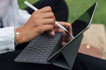 Woman Working From The Backyard