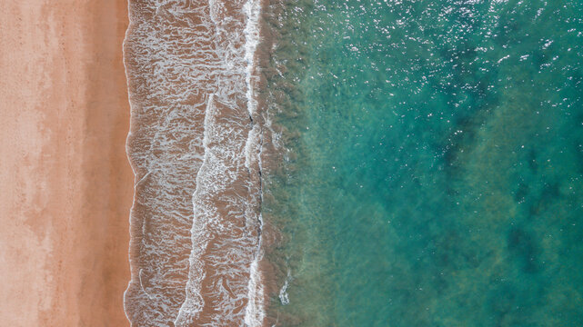 Breaking Wave In Turquoise Ocean
