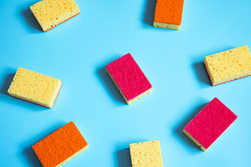 Colorful composition with sponges for washing, cleaning and keeping clean.