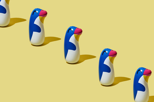line of penguin-shaped floaties