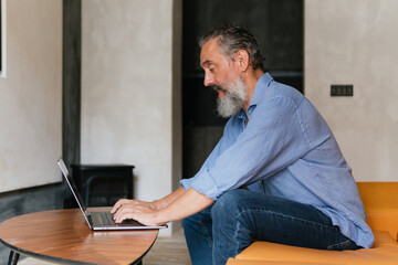 Senior man using computer