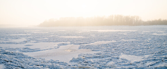 Landscape Of A Frozen River At Sunset. Large Panorama.