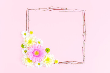 Creative layout composition of flowers on pastel background.