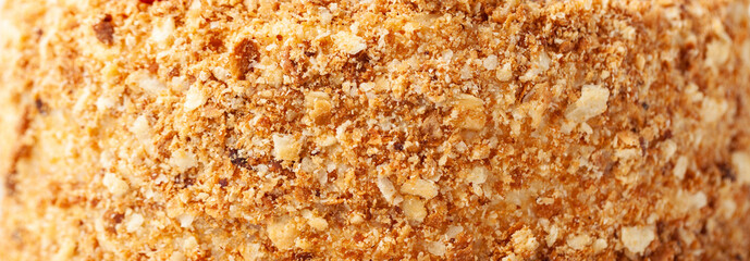 Honeycake with a lot of crunchy crumbs. cake textured background