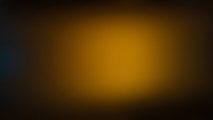yellow light spot on a dark background - screen, blurred background.