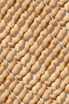 Natural food background from organic peanuts.
