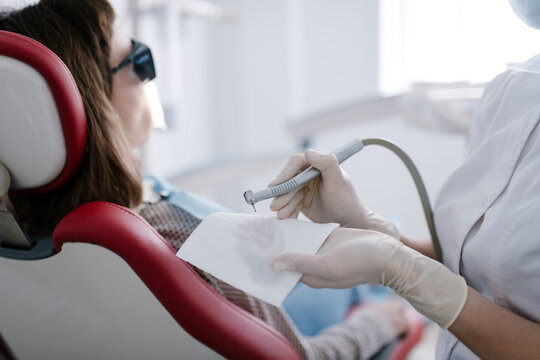 Dental office: Dentist treating patient
