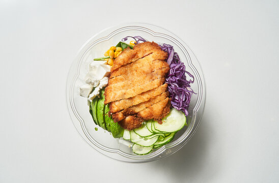 Appetizing salad in bowl on table