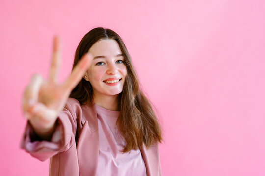 girl funny posing for the camera, cute childish atmosphere