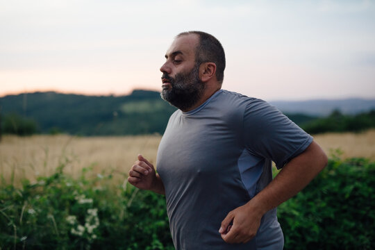 Man Running In Nature