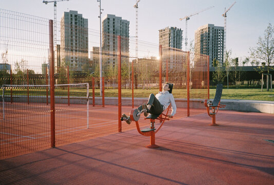 young man on exercise bike