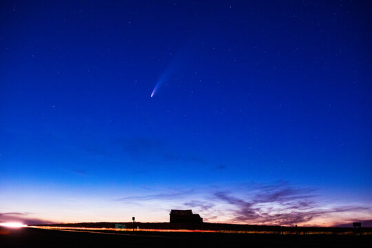The comet Neowise streaks through the night sky