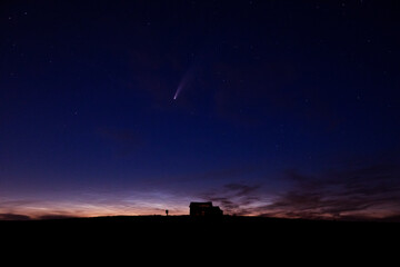 The comet Neowise streaks through the night sky