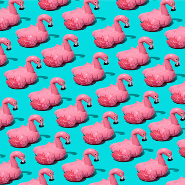mosaic of pink flamingo-shaped floaties