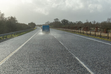 Bad visibility from the cab of a car on rainy day .