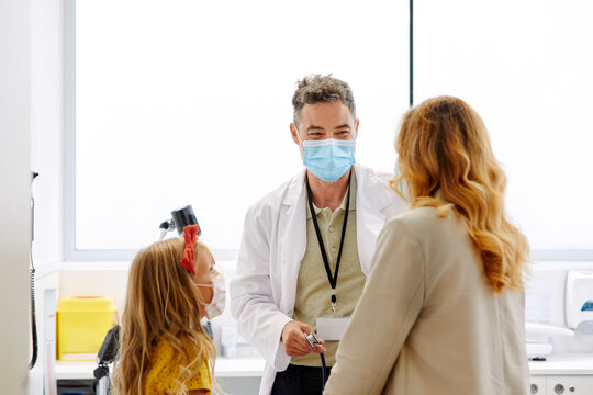 Pediatrician laughing