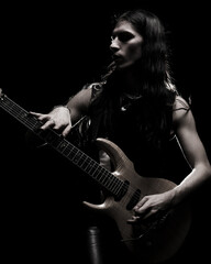 Obraz premium man playing electrical guitar