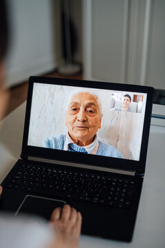 Mother and daughter having a video call