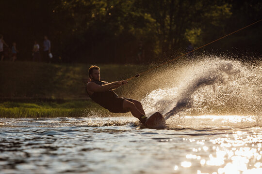 Man Surfing On A Wakeboard