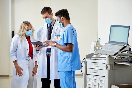 Two doctors and male nurse