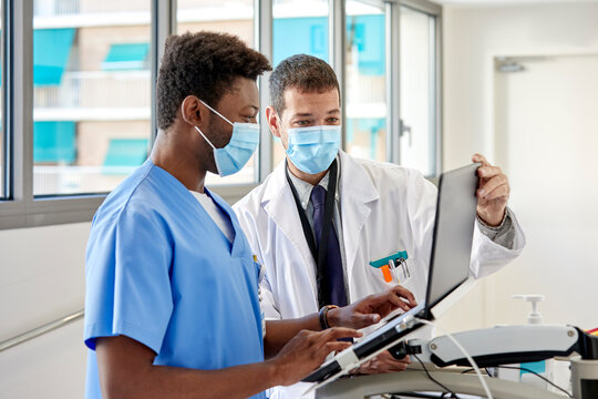 Male nurse and doctor