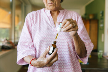Senior Citizen Using CBD Cannabis Oil