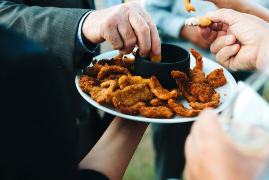 Serving fried snacks with dip