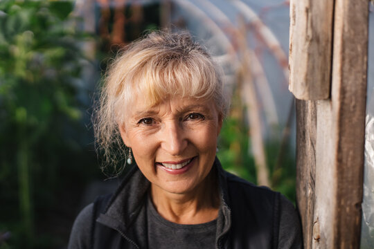 Smiling Portrait Of Mature Gardner Woman.