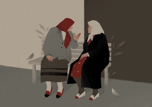 Two Old Women Talking To Each Other While Sitting On A Bench. Aging Up Concept