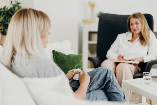 Upset client speaking with psychologist