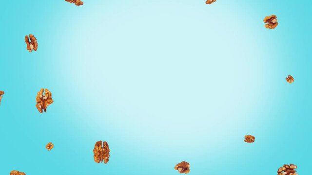 Brain shaped walnuts on blue background. Food stop motion animation. Funny food stop motion animation.