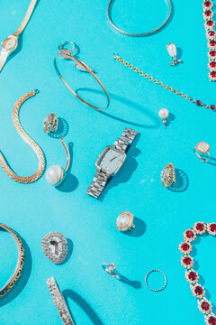 Jewellery,Diamonds, Ruby, Gold, Silver Etc/ On Turquoise Background