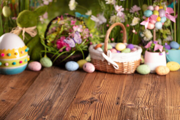 Easter theme. Easter eggs. Colorful tulips. Easter baskets. Rustic wooden table. 