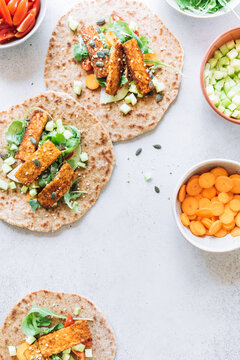 Homemade tacos with spicy tempeh and veggies
