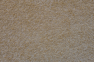 abstract background of light brown carpet texture close up