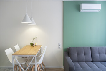 Scandinavian design dining table with lights.