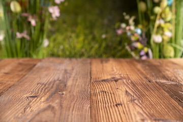 Easter theme. Easter eggs. Colorful tulips. Easter baskets. Rustic wooden table. 