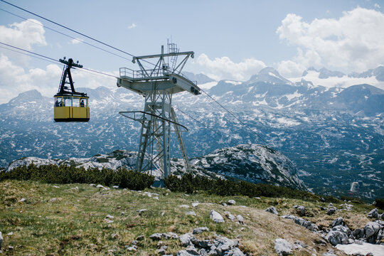 Yellow Chairlift Or Cable Car In Mountains Travelling