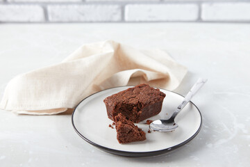 Chocolate brownies dessert on plate with napkin. Bakery, confectionery concept