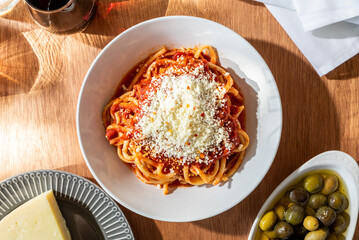 spaghetti puttanesca dish on table