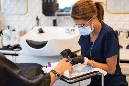 Manicurist working