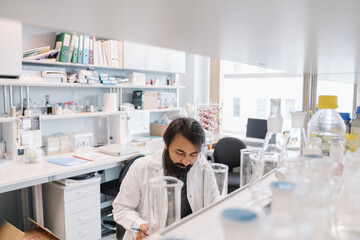 Researcher Analyzing Data In A Lab