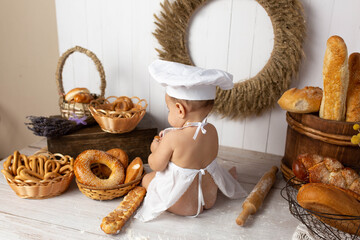 one-year-old child, a child dressed as a cook