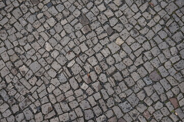 Cobblestone pattern with drop of rain