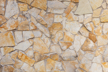 Gray stone wall background. Stone wall texture. Old castle stone wall texture background. Stone wall as background or texture. Part of a stone wall, for background or texture. 