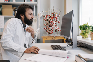 Researcher Using Computer In A Laboratory
