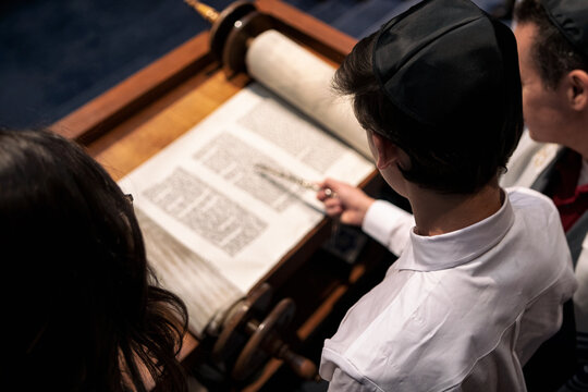 Synagogue: Over Shoulder Of Teen Doing Torah Reading