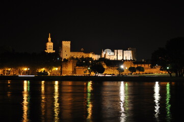 Fototapeta premium Night view of the illuminated Papal Palace in Avignon, France