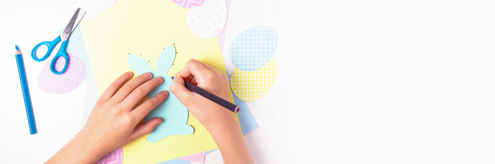 Easter activities. Dot to dot painting bunny game. Line art easter rabbit game for children. Dot to dot drawing activity page. Selective focus. Top view. Banner with copy space. 