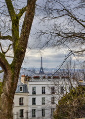 Scenic view of Parisian roofs and Eiffel tower from Montmartre
